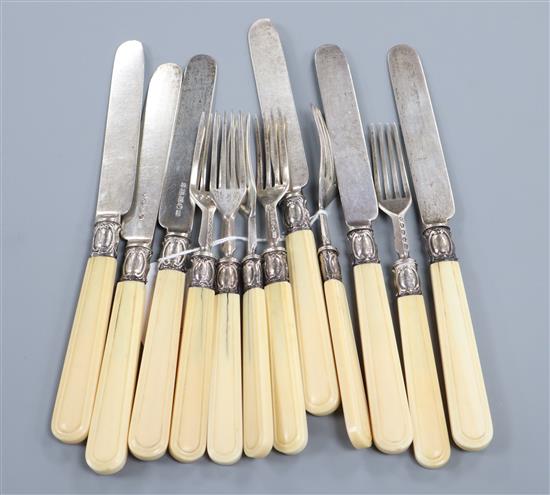 Six pairs of Victorian ivory handled silver fruit eaters, John Gamage, Birmingham, 1871/2.